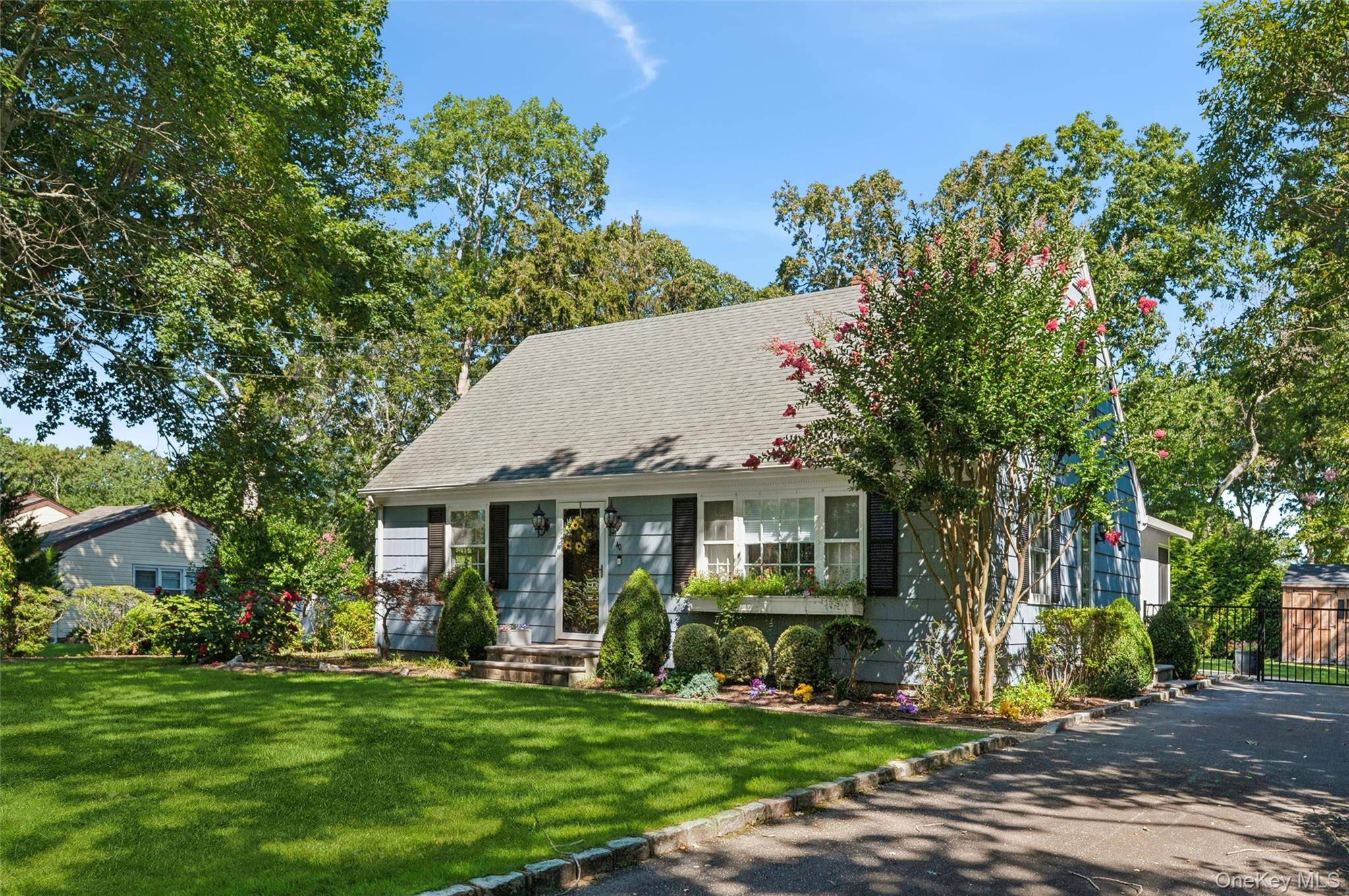 Nestled on a quiet, tree lined street south of the highway, this immaculate coastal Cape embodies the perfect balance of relaxed living and refined modern upgrades.