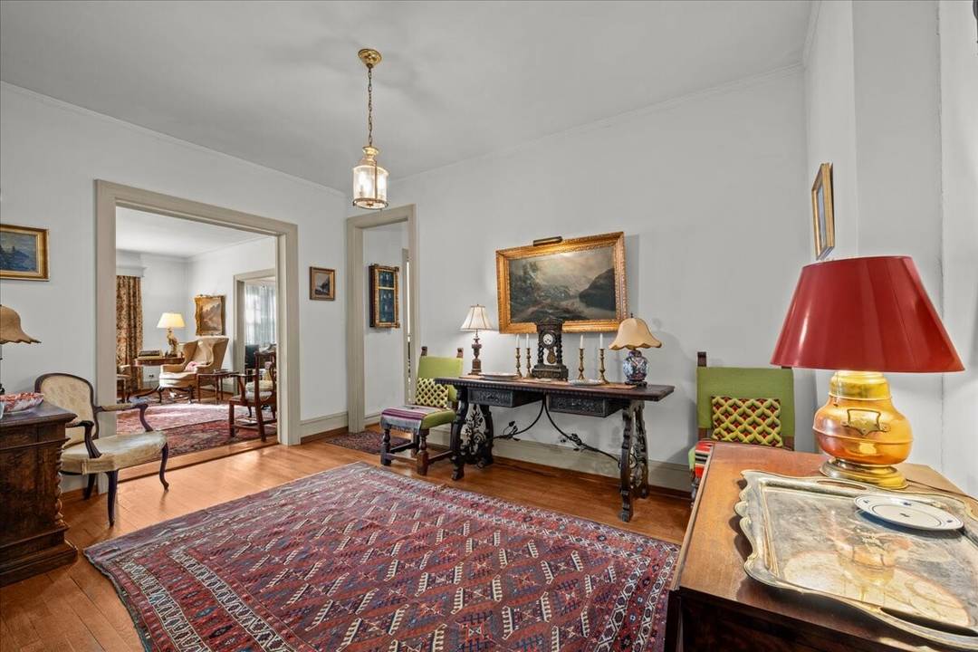 Fieldston Gardens, built in 1926, is a charming Tudor style residence offering a blend of modern convenience and vintage character.