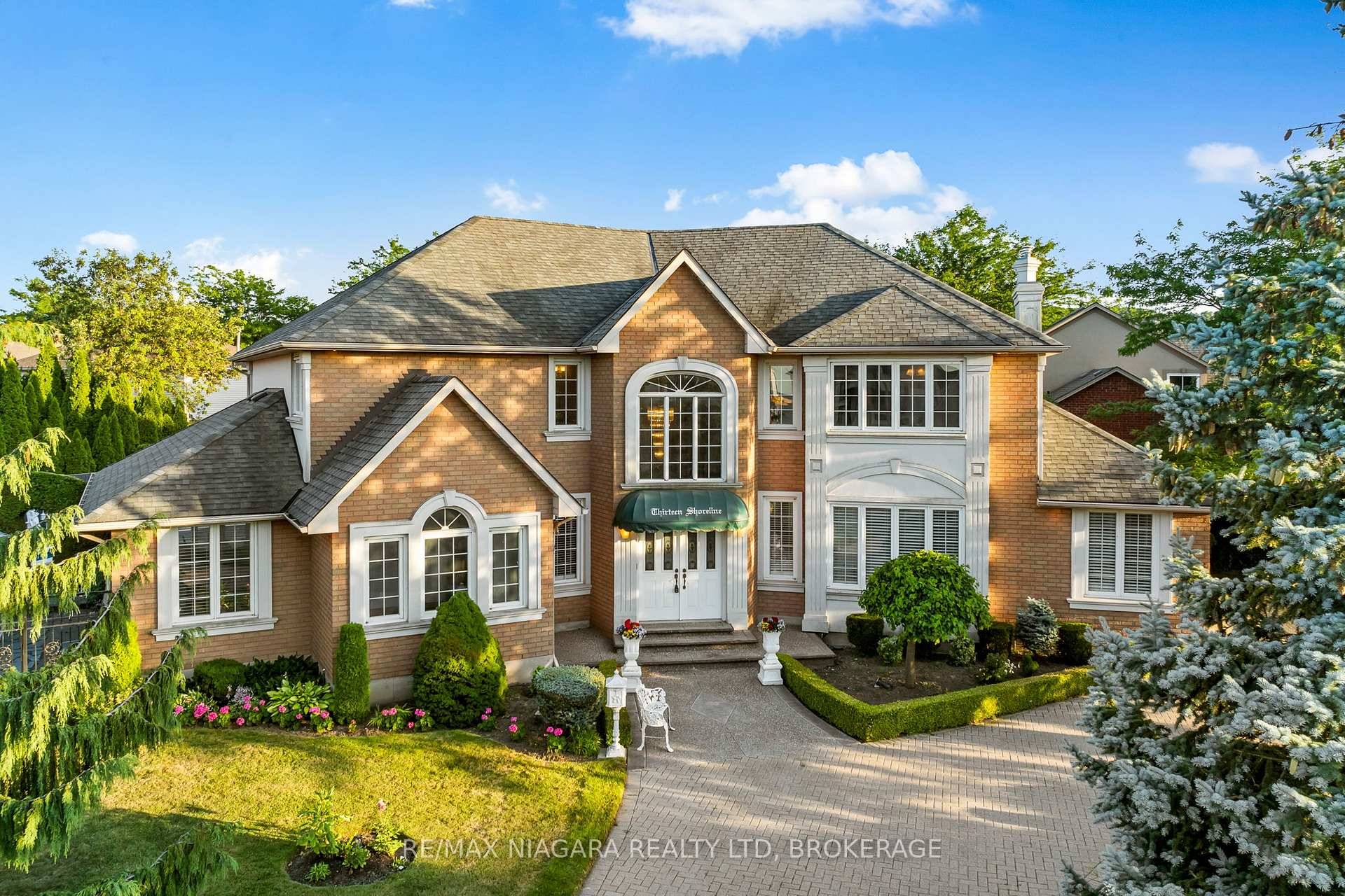 Welcome to the definition of luxury living at 13 Shoreline Crescent in Grimsby, just steps from the water and surrounded by prestigious estate style homes.