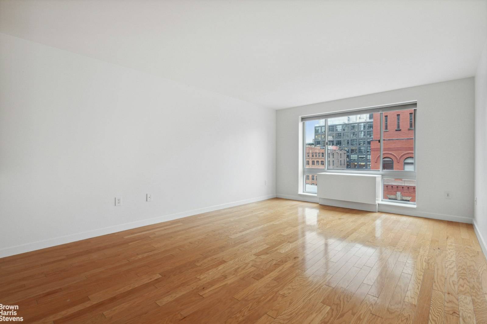 Extra spacious, luxuriously renovated 1 bedroom end unit at 555 West 23rd Street in chic West Chelsea.
