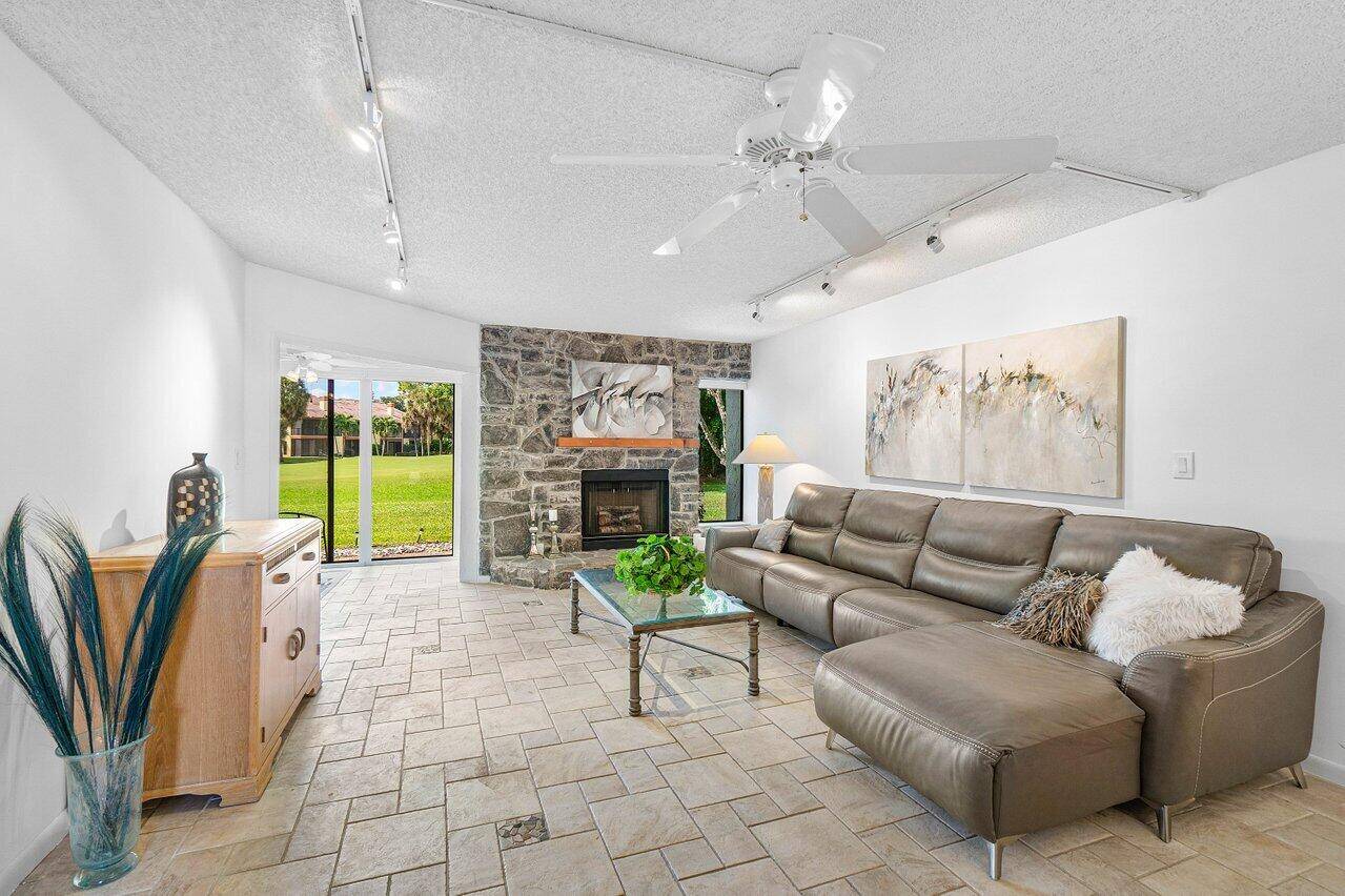 1st Floor Corner 3 Bedroom Garden Apartment on the 10th fairway Wood burning fireplace NEW ROOF 2023 Private Patio for BBQ A C 2020 Plantation Shutter in kitchen Hurricane shutter ...