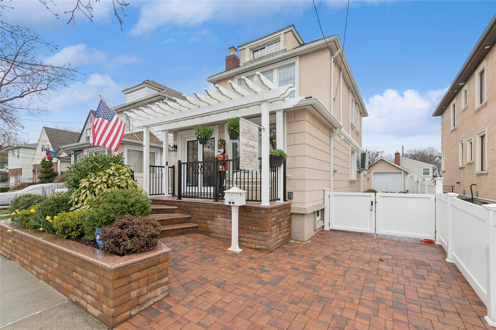 Enter into timeless charm and modern elegance with this stunning 3 bed, 2 bath Colonial in the heart of Floral Park.