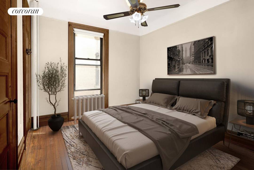 A massive, full floor Convertible 3 bedroom Harlem brownstone coop residence in the Central Harlem Historic District, perfectly positioned on the parlor level of 152 West 131st Street.