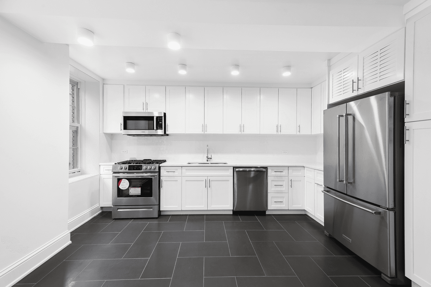 Be the first to see this gut renovated corner unit with LAUNDRY IN THE UNIT !