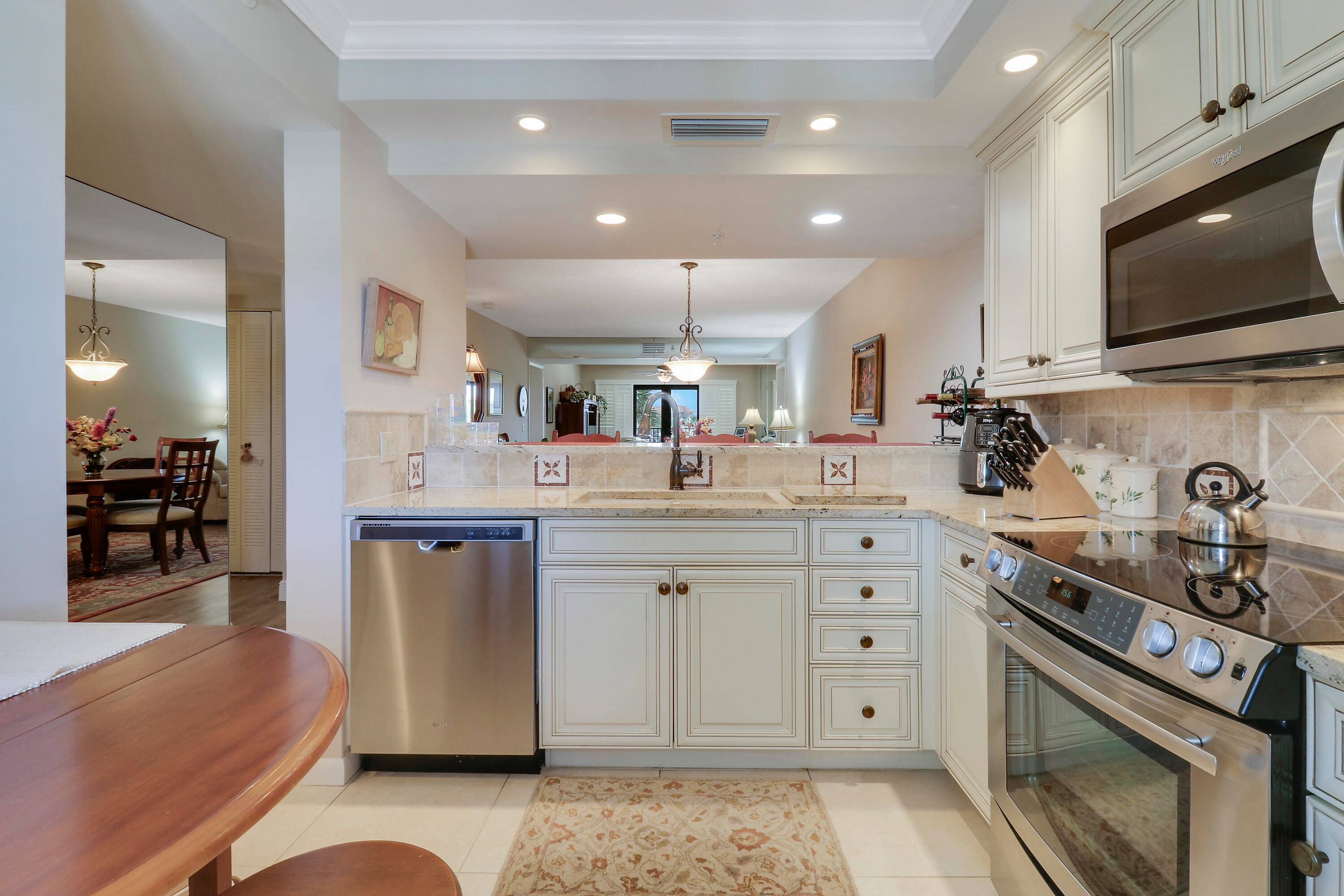 Come see this RARELY available CORNER UNIT condo in the Marina at the Bluffs !