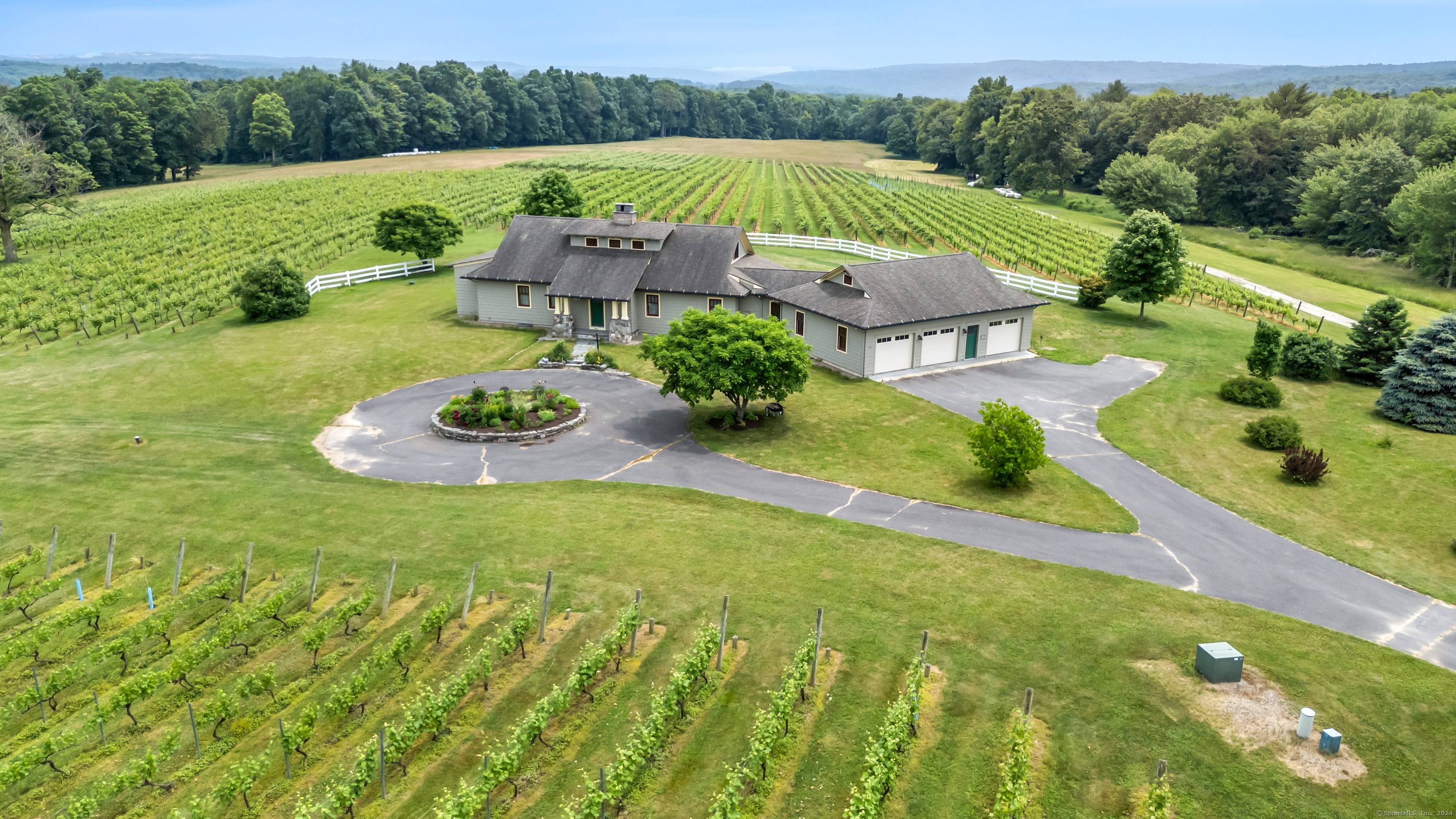 Cassidy Hill Vineyard and the owners residence sit on picturesque fertile land overlooking the rolling hills of Eastern Connecticut.