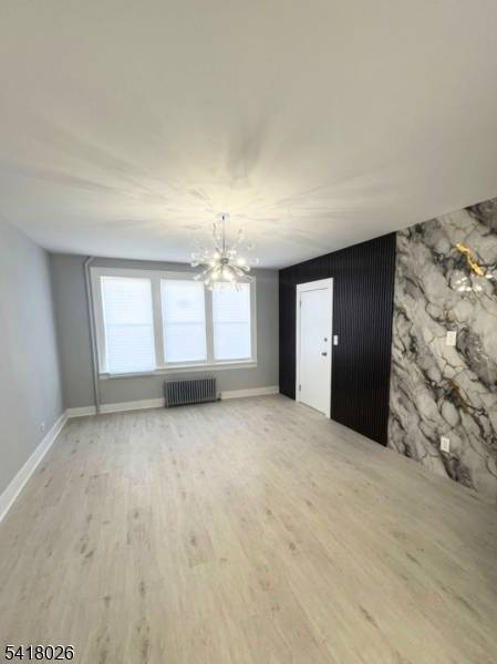 Well maintained two family property offering 7 bedrooms and 2 full baths, ideal for both owner occupants and investors.