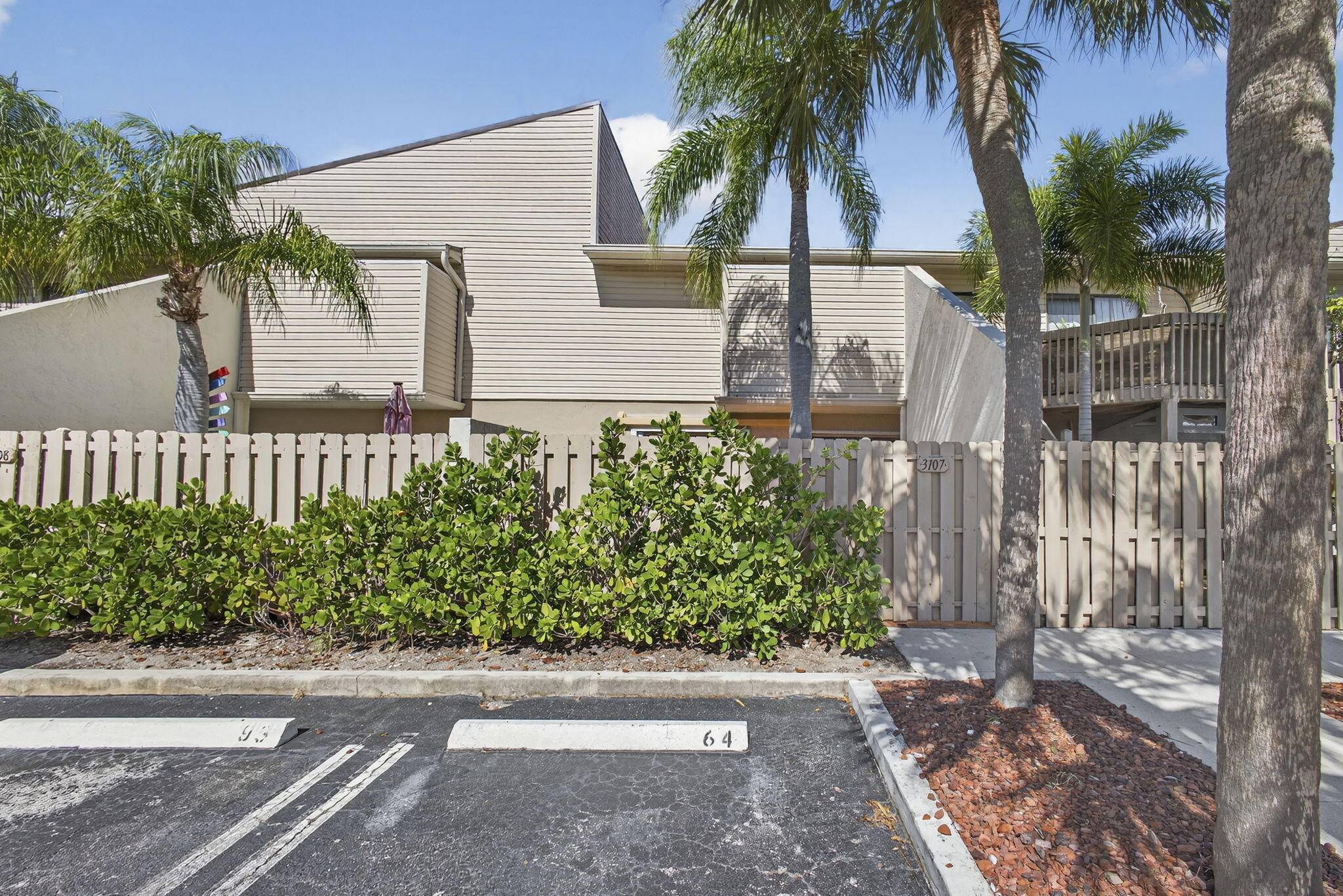 Enjoy comfortable living in this first floor condo in the gated community of Lake Place.