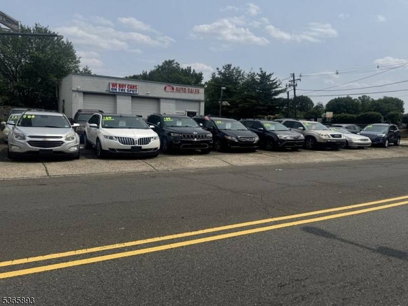 'Used Car Dealership Redevelopment Opportunity CBD Zoned Mixed Use Property.
