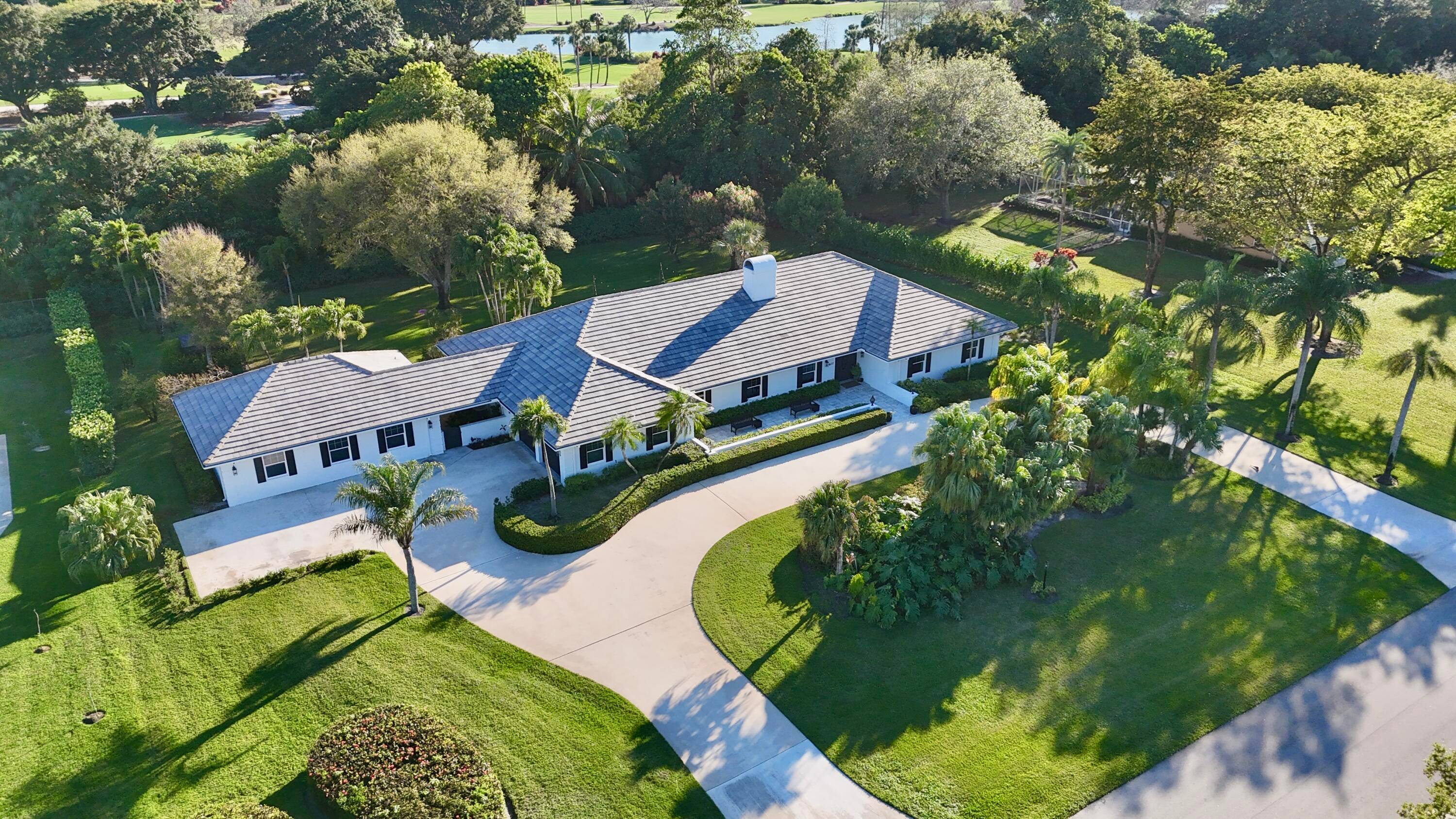 One of a Kind Estate with Guest House in Prestigious Banyan Estates !