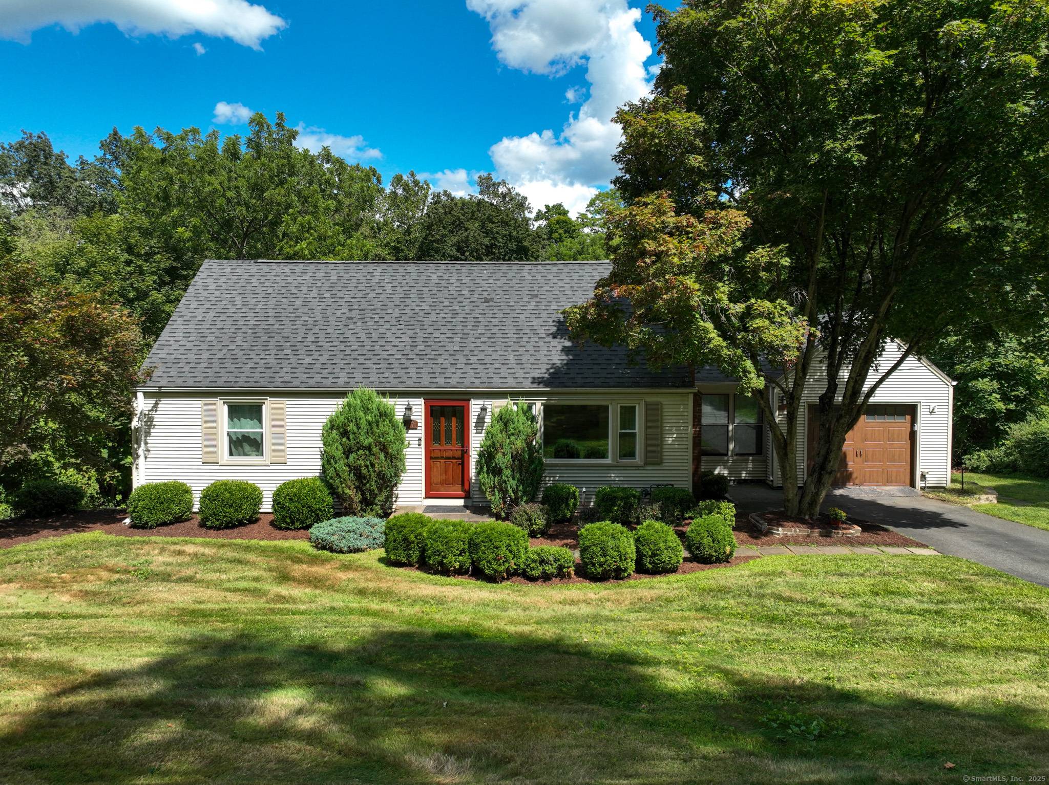 Discover the charm of this beautifully remodeled Cape Cod home, nestled in the heart of South Glastonbury Village.
