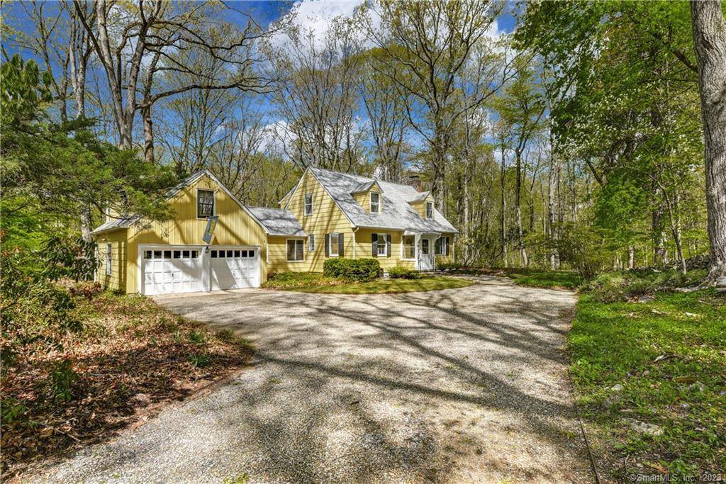 Charming Cape Cod Retreat on 6 Private Wooded Acres Tucked away on six secluded acres of lush woods with a picturesque pond, this charming Cape Cod style home offers the ...