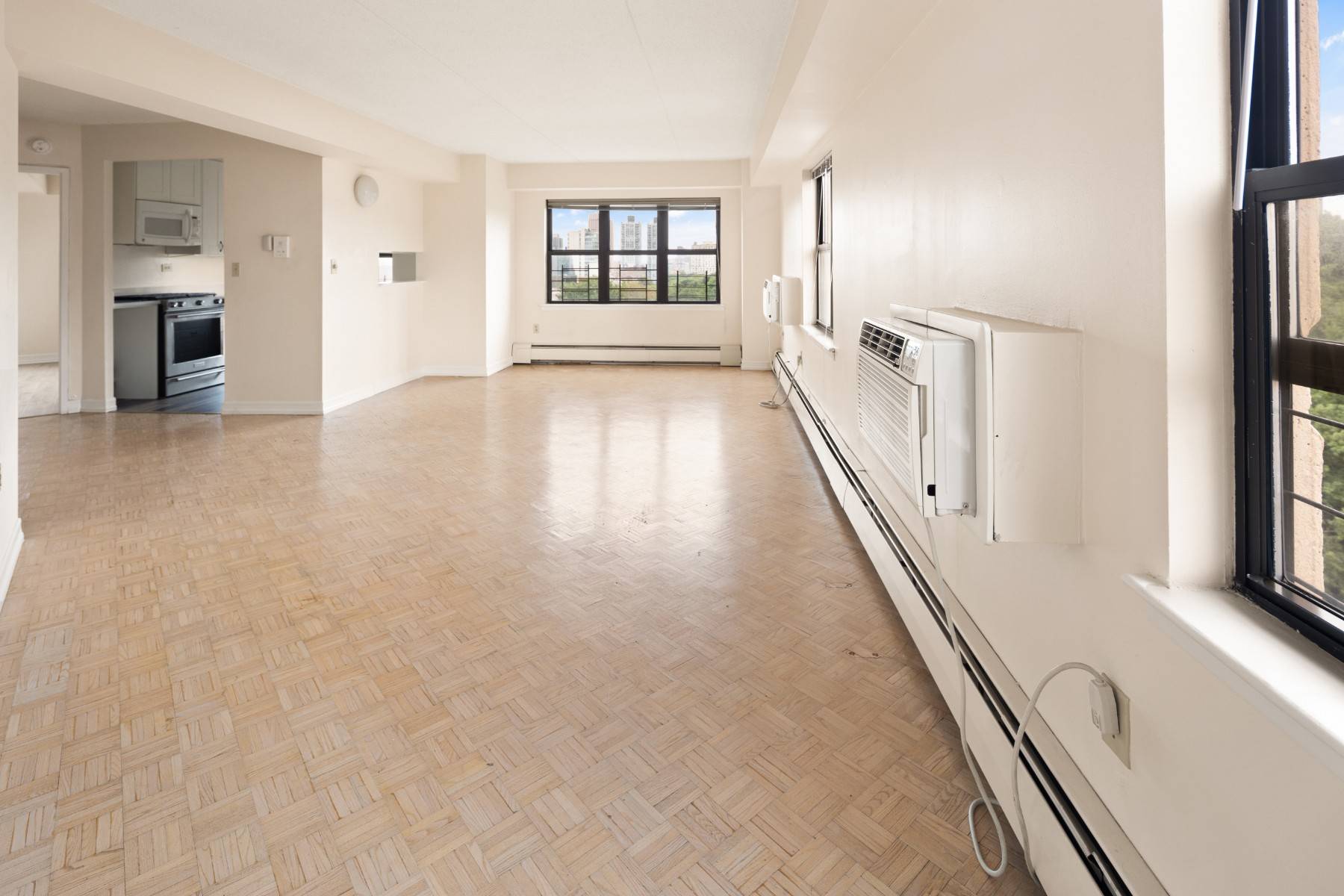 Welcome to Unit 10E at 300 E 110th Sta spacious, sun filled one bedroom apartment with stunning, unobstructed views of Central Park.