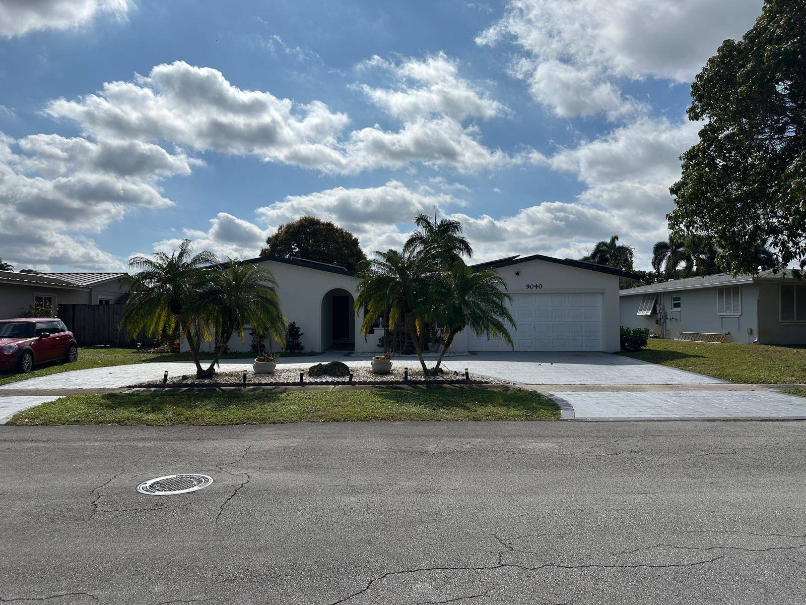 Step into a realm of comfort and sophistication with this stunning 4 bedroom, 2 bathroom pool home, complete with a spacious 2 car garage.
