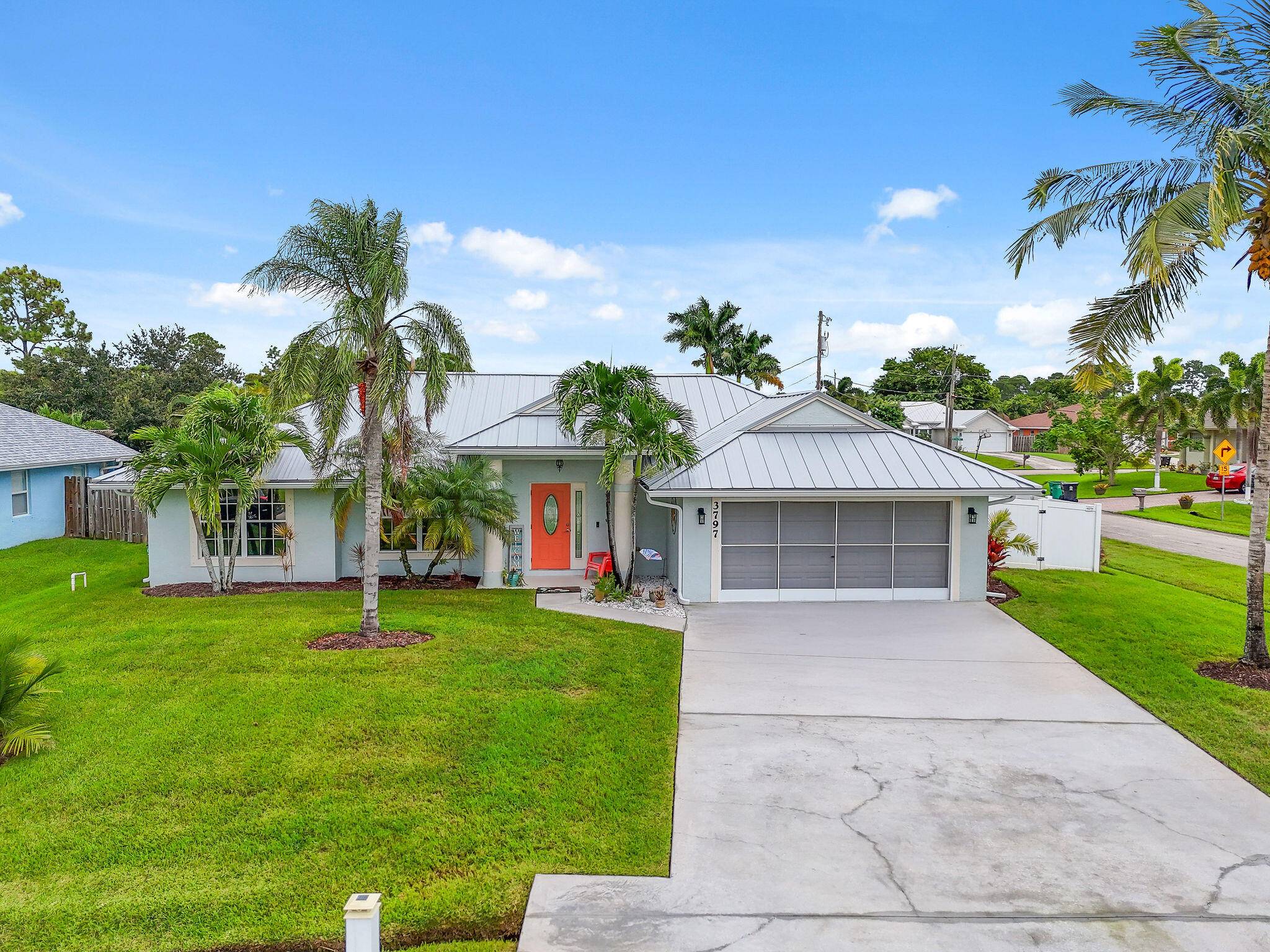 3BR 2BA CBS POOL home sitting beautifully on corner lot showcases a spacious split floor plan with vaulted ceilings, rounded wall edges, tinted windows a bright, open concept design.