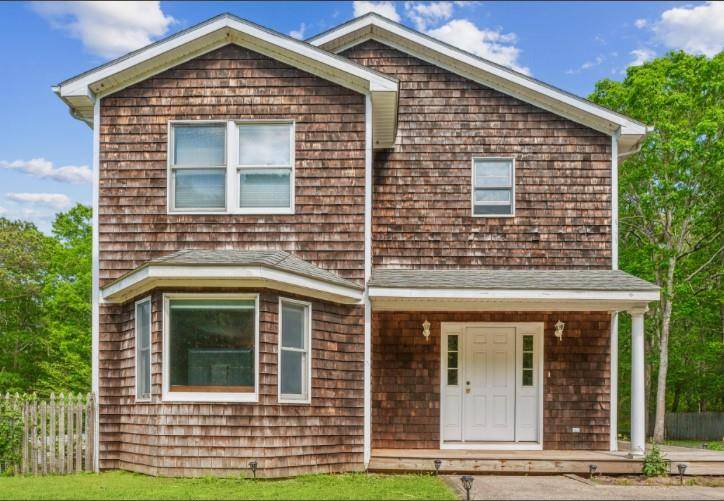 NESTLED DOWN A LONG PRIVATE DRIVEWAY AND BORDERED BY A SERENE RESERVE, THIS SUB DIVIDABLE 4.