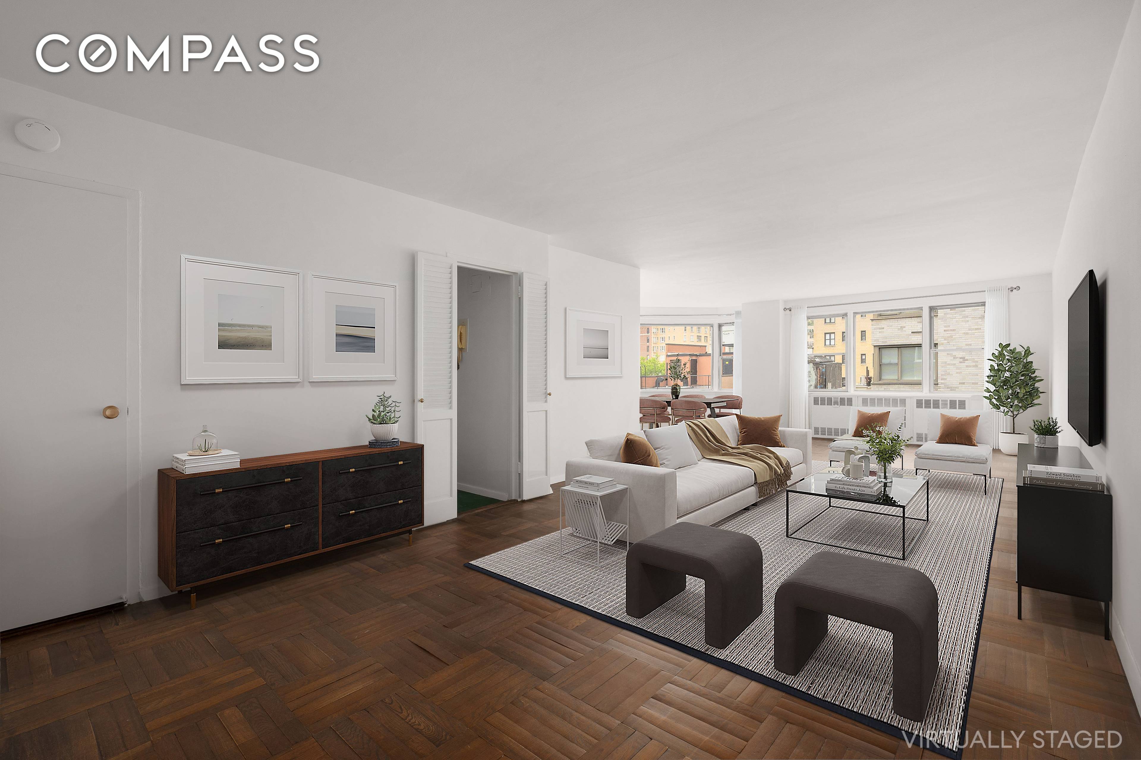Spacious corner two bedroom, two bath residence with endless possibilities in a prime Lenox Hill location.