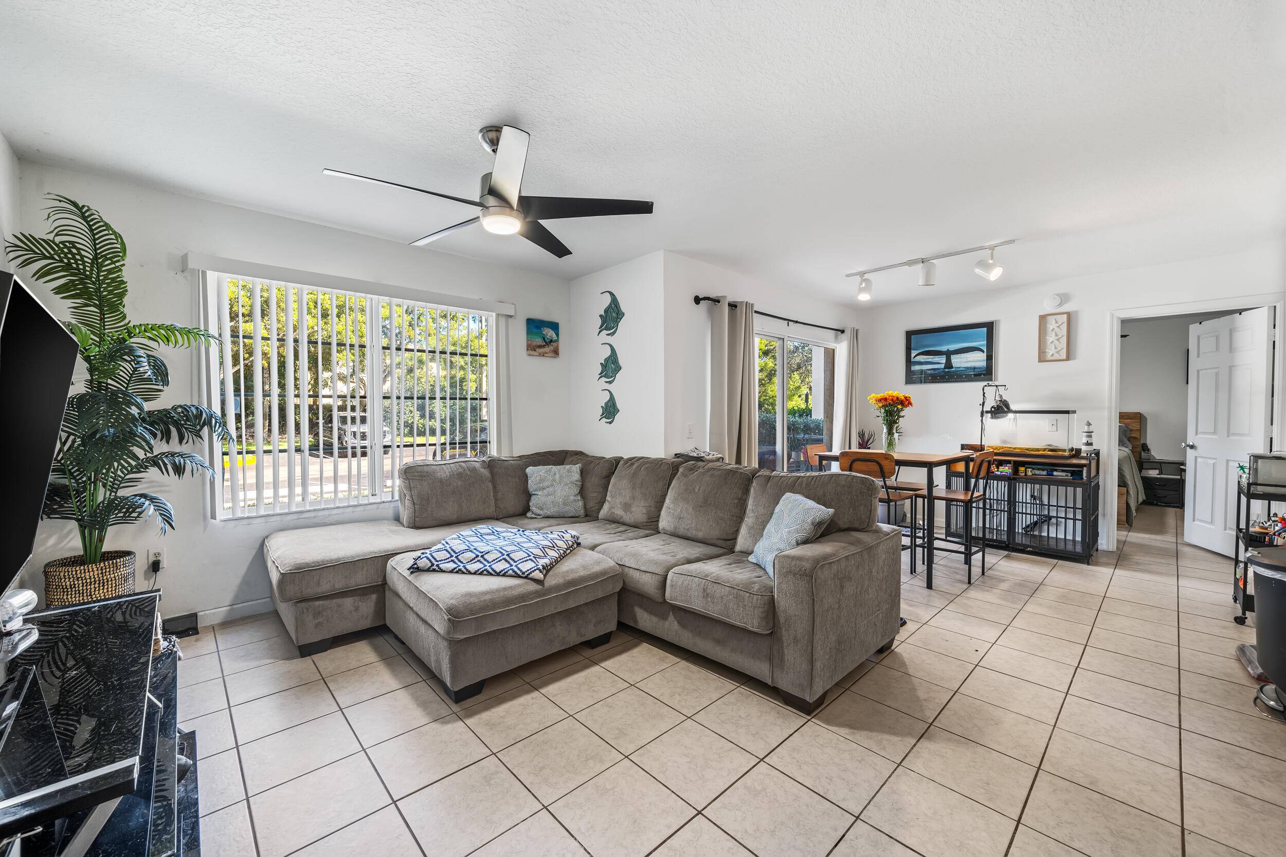 Step into this beautifully spacious one bedroom, one bathroom first floor corner unit located in the desirable gated community of Emerald Isles in West Palm Beach.