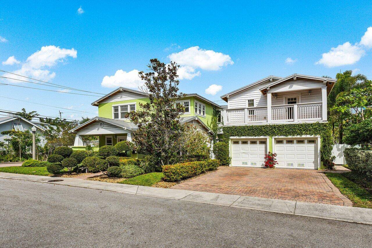 Historic 1920's POOL HOME in Mango Promenade with modern finishes on a quaint street with 2 car garage and separate guest suite.
