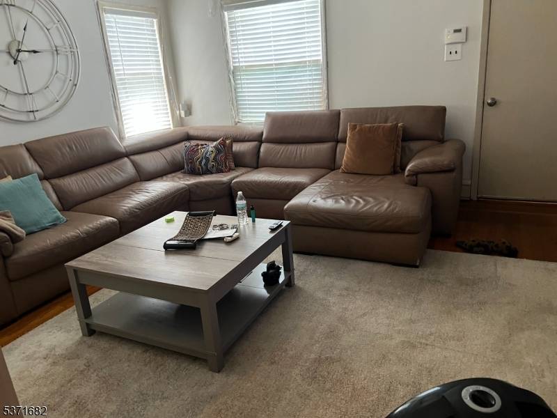 Charming Tudor style home located in quiet, peaceful neighborhood of Union with a beautifully finished Family Room with a Bar in the basement and a spacious half Bath as well.