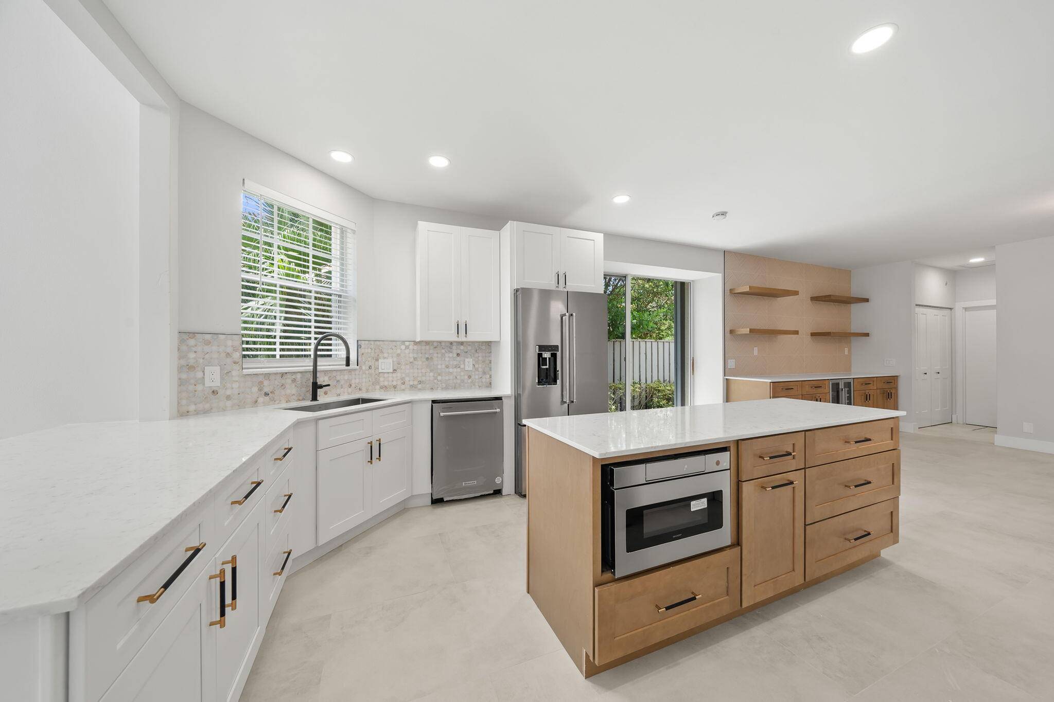 Step into this impeccably renovated 3 bedroom, 3.
