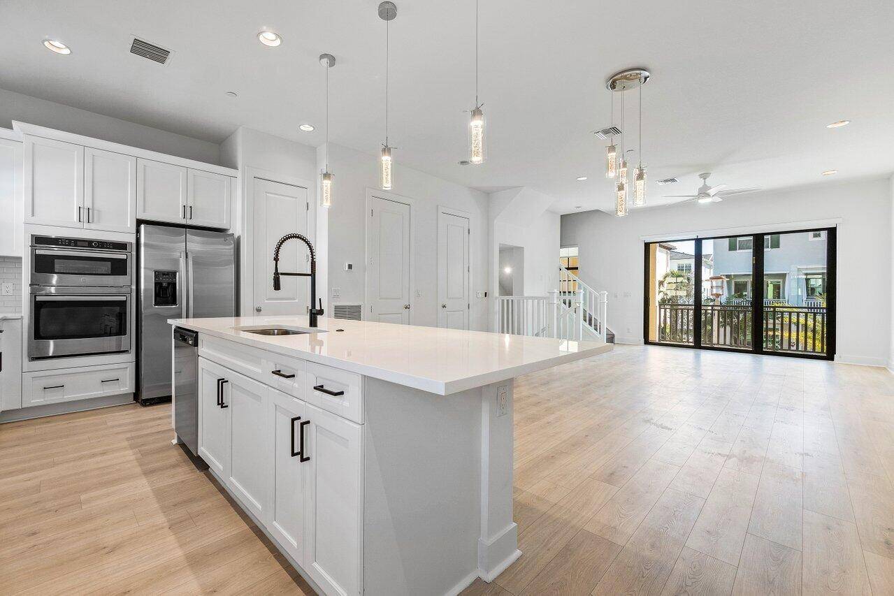 Light and bright, this stunning Townhome B, built in 2022, offers modern elegance and comfort.