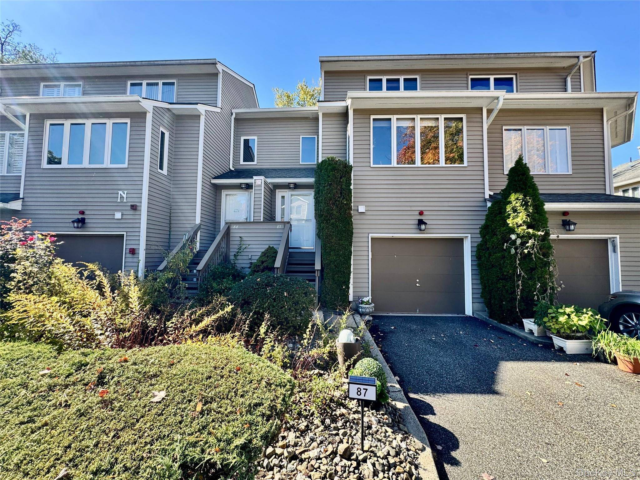 Welcome to this charming townhouse featuring one bedroom plus a loft and two and a half bathrooms, located in the sought after Village Green community !