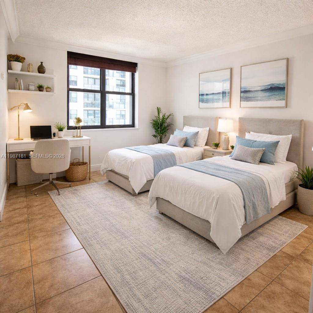 Experience beachfront living in this spacious corner 2 bedroom, 2 bath den residence located directly on the ocean in Hollywood Beach.