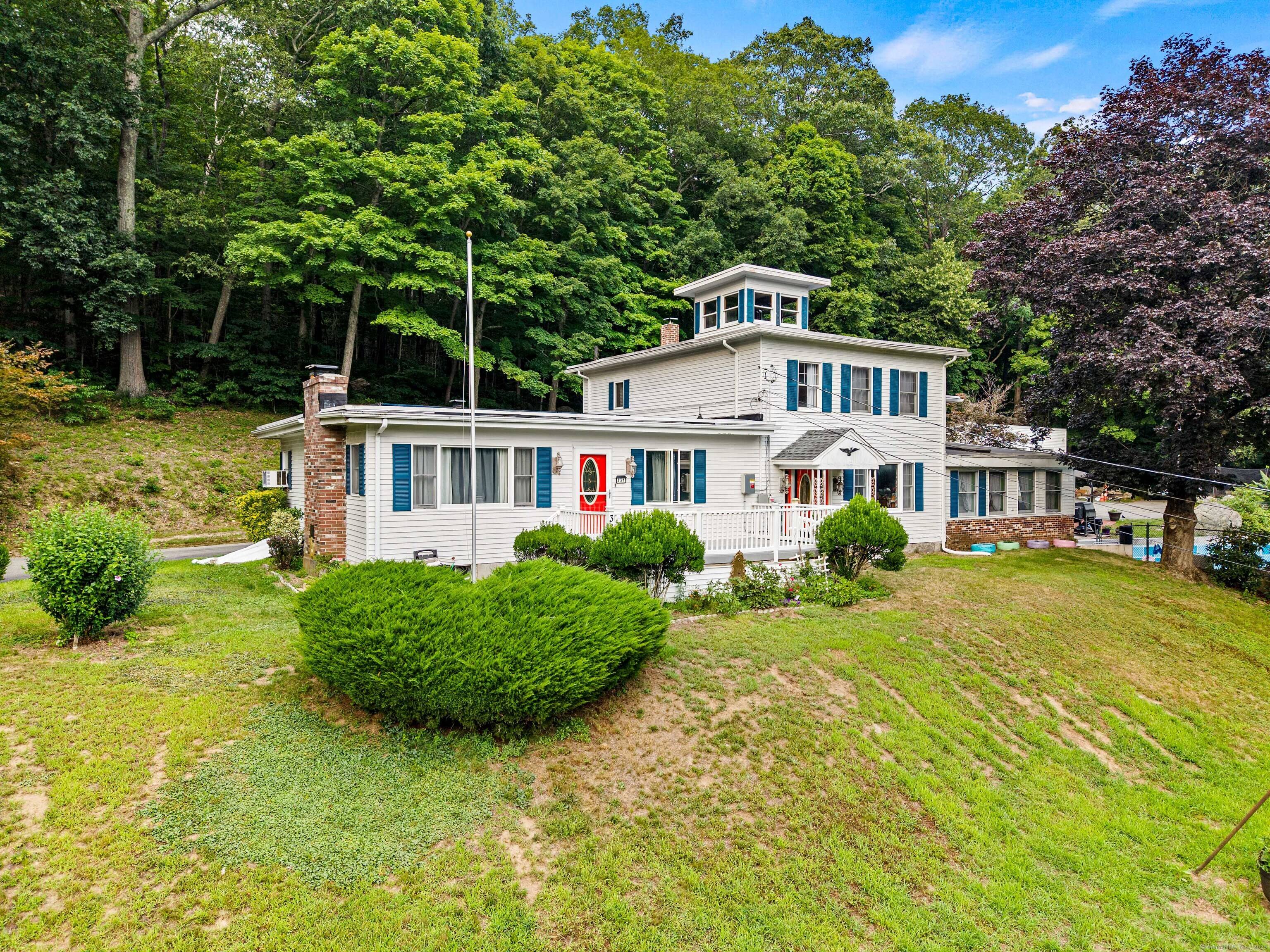 Welcome to this rare 2 family home set on a beautiful 3.