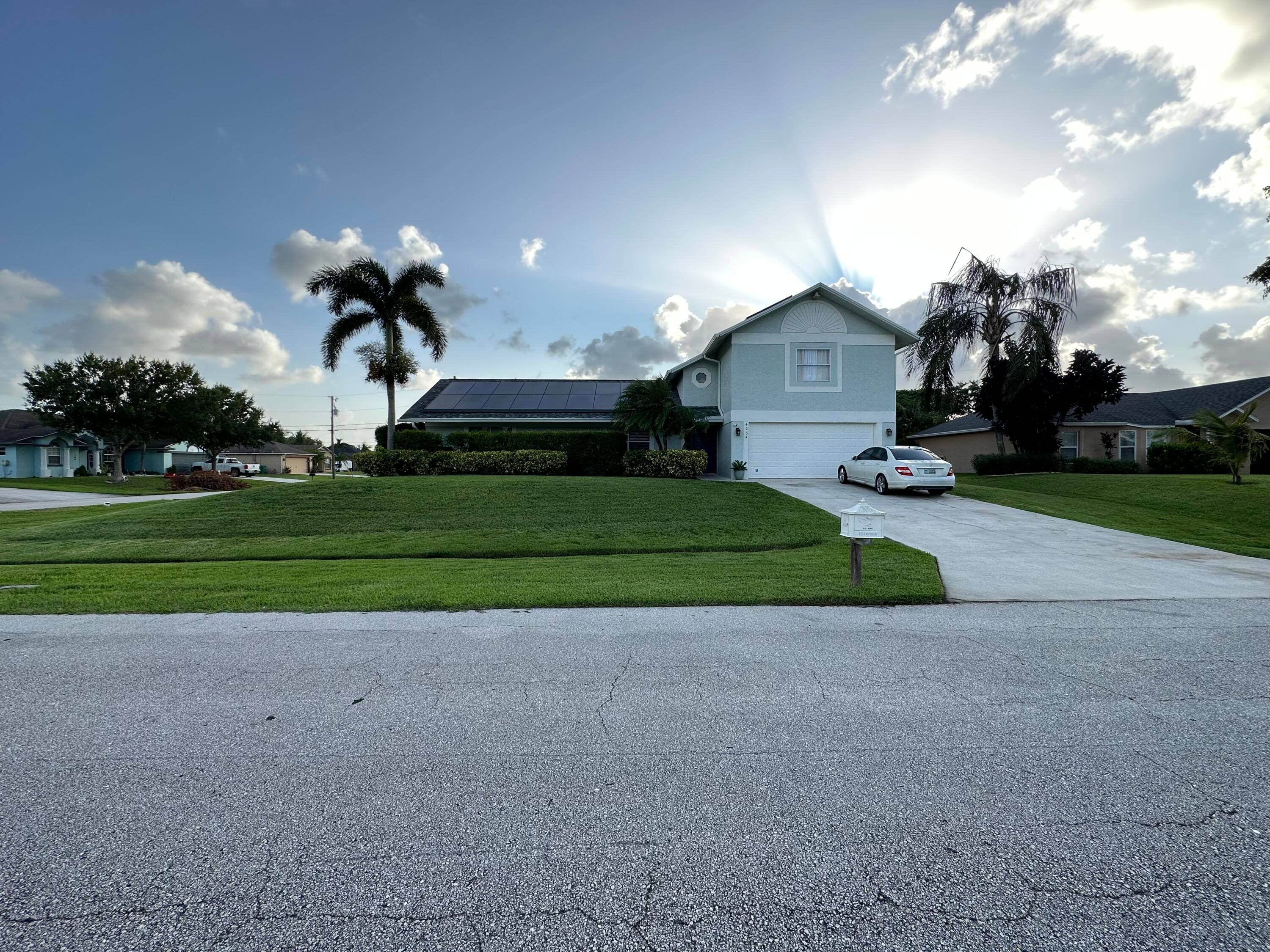 This well maintained, beautifully appointed 4 bed 2 bath home sits on an oversized corner lot with easy access to both the Turnpike and I 95.