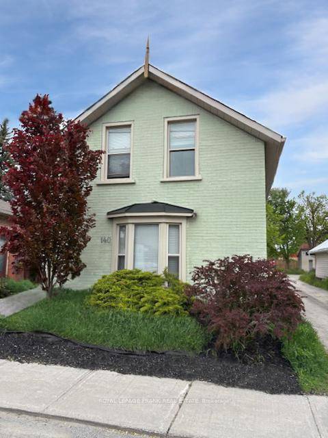 A charming, all brick 1. 5 storey home in a prime downtown location.