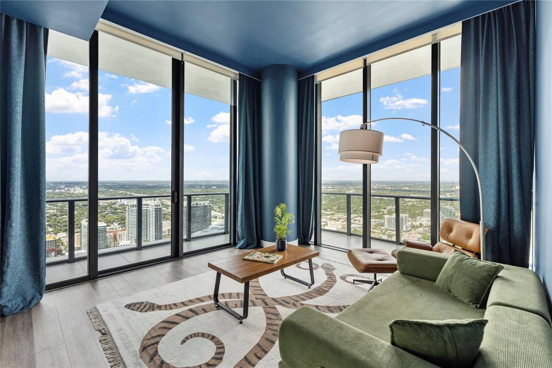 DRASTIC PRICE REDUCTION Corner Penthouse with 951 sq ft of a wraparound balcony.