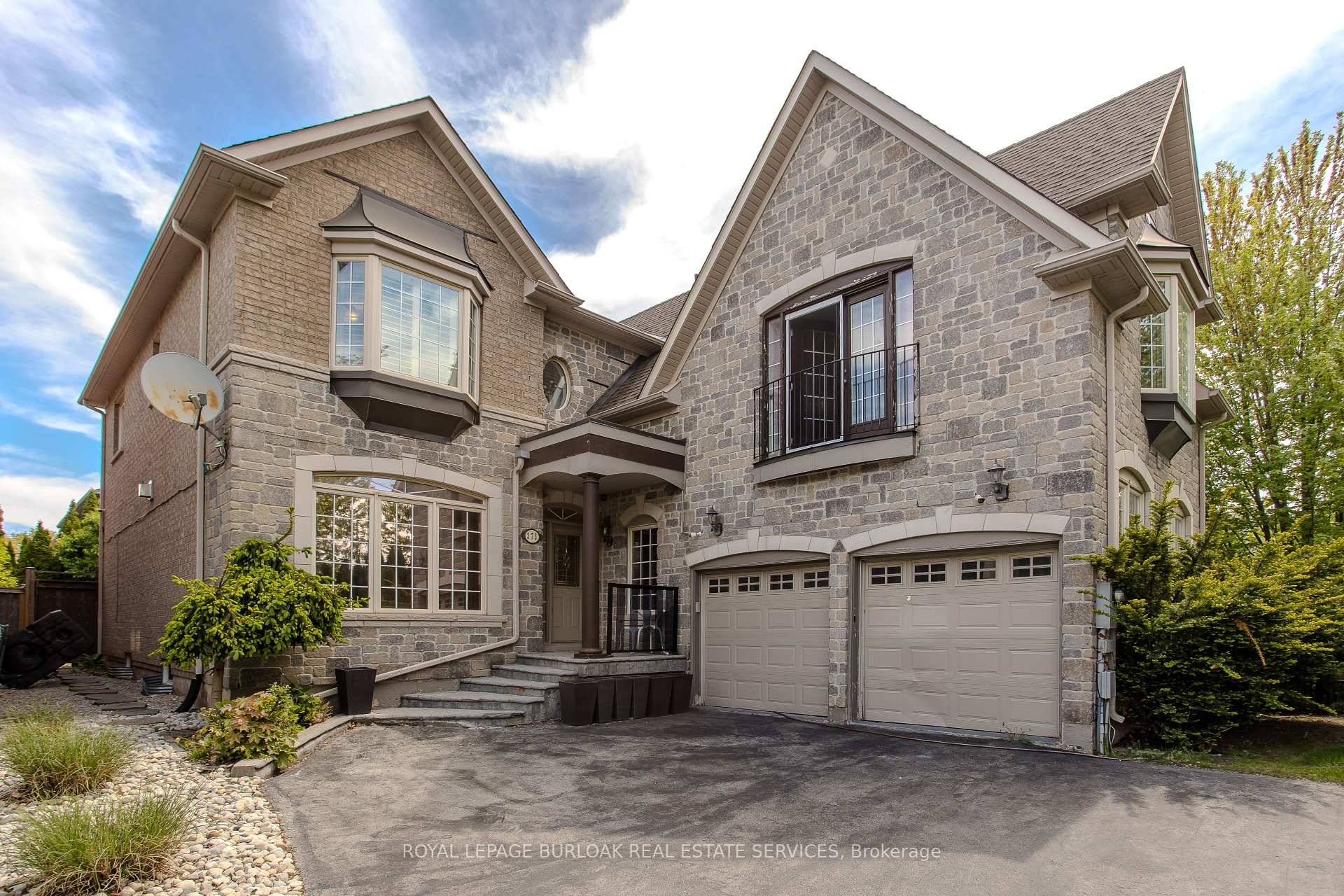 Nestled on a beautifully landscaped corner lot in the coveted Lakeshore Woods community, this exquisite residence blends timeless elegance with modern family living.