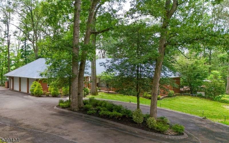 Welcome to your private oasis in a quiet Watchung cul de sac.