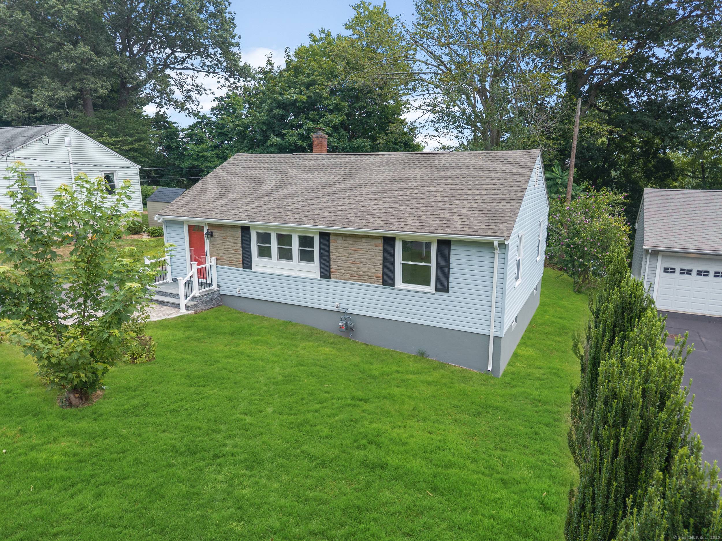 This beautifully remodeled ranch style home offers two bedrooms and two fully renovated bathrooms with Blue Tooth ceiling Light Radio, one on main level the second in the lower level.