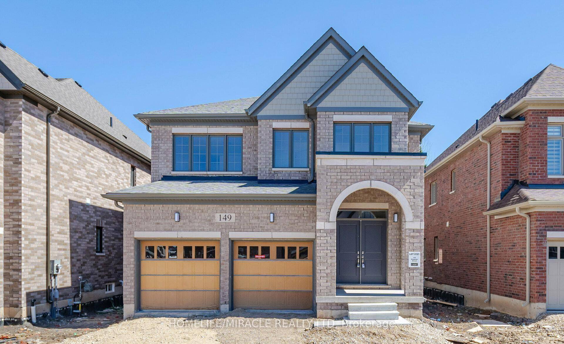 Welcome to this beautiful, detached home situated on a premium lot with no sidewalk, offering extra parking and exceptional curb appeal.