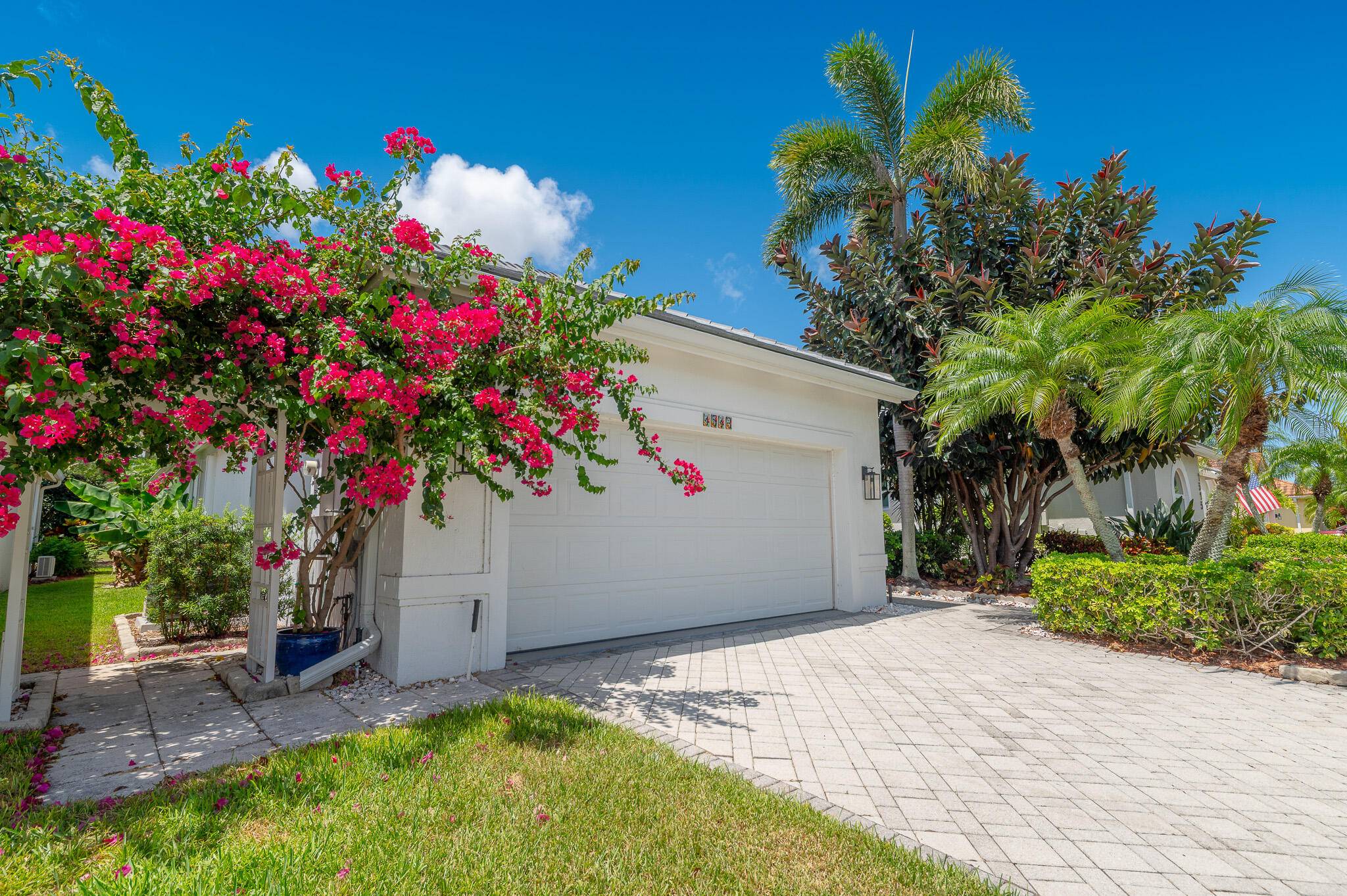 NEW ROOF ! This spacious home with updated, kitchen and bathrooms and screened lanai overlooking golf course.