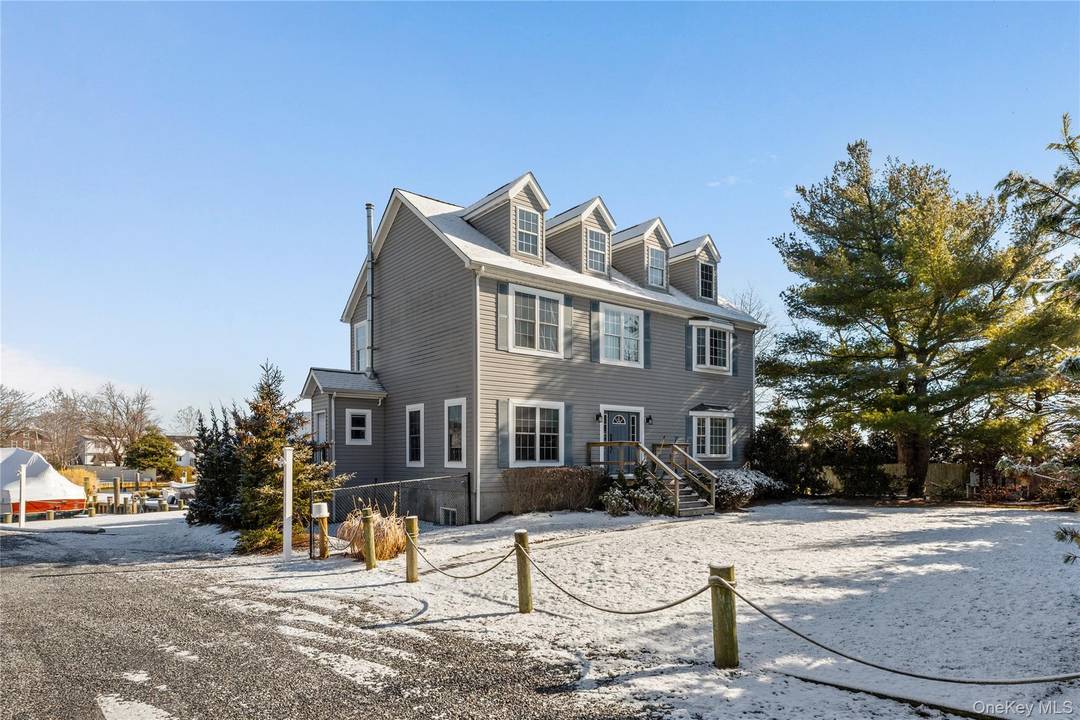 Updated Waterfront Central hall colonial w 9 ft ceilings and water views from most rooms in the home.