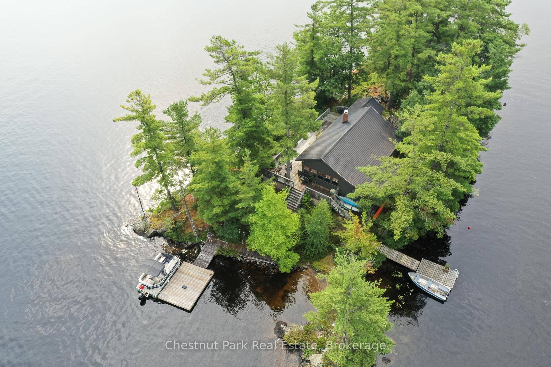 Discover the undeniable joys of private island ownership awaiting you at Rose Island on Beautiful Kahshe Lake.
