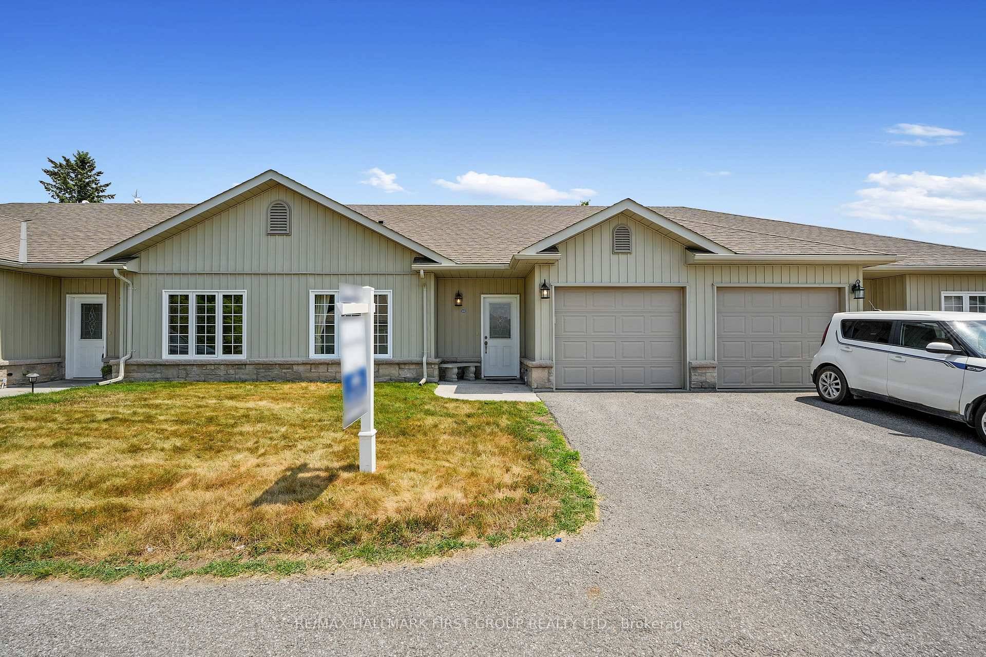This low maintenance, one level townhouse features an efficient layout with carpet free flooring in the main living areas, prioritizing comfort and ease.