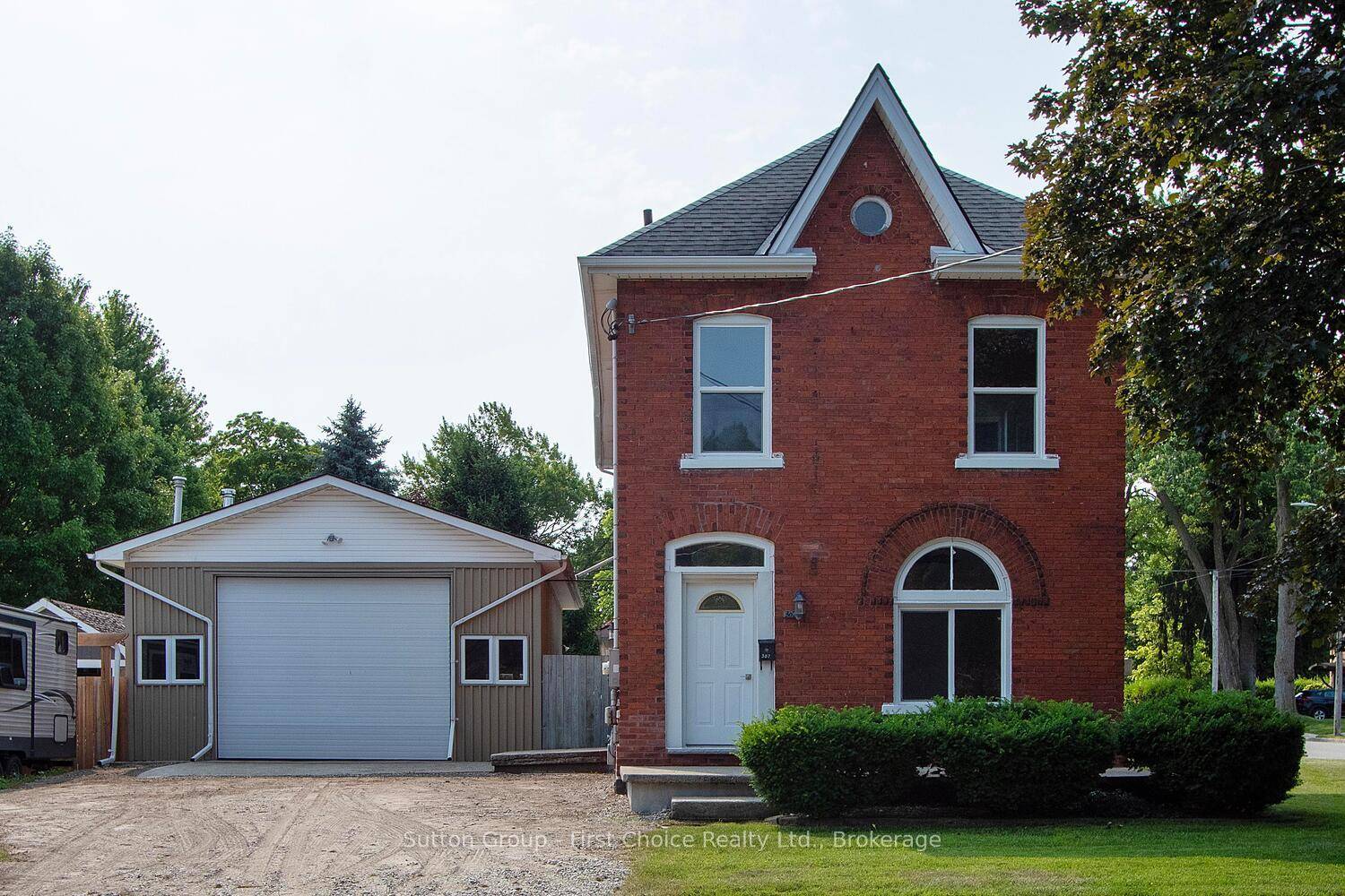 Stunning Renovated Home on a Spacious Corner Lot with Workshop !
