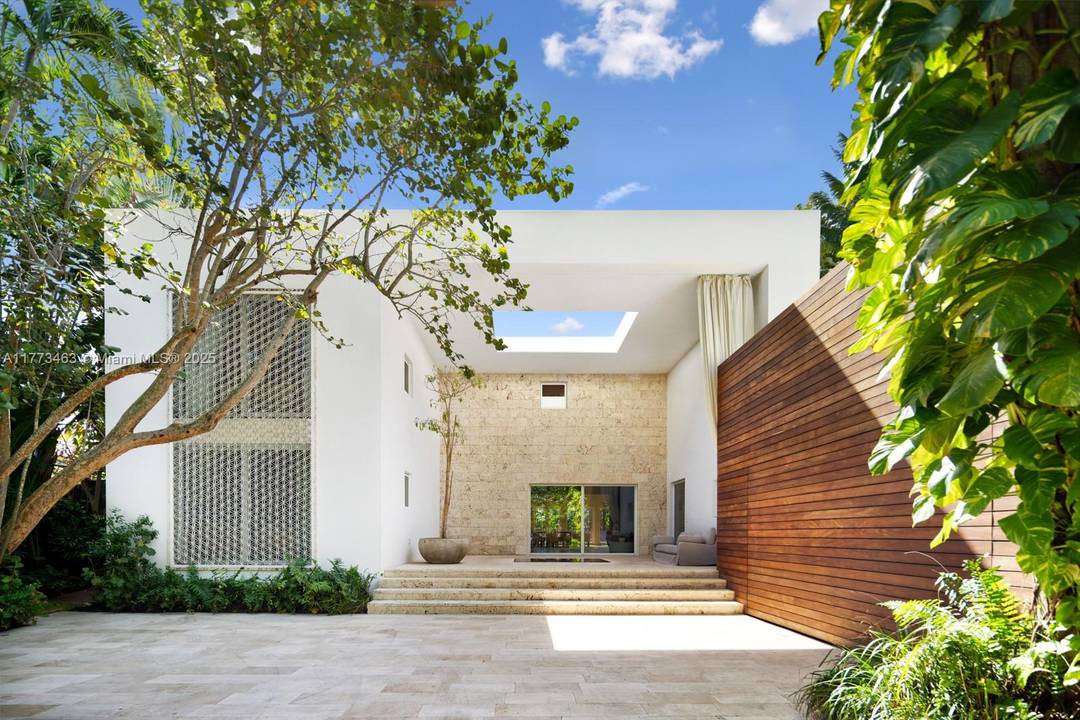 Designed by world renowned architect Chad Oppenheim, Villa Allegra is a stunning tropical modern home on Sunset Island III, one of the most coveted gated communities on Miami Beach.