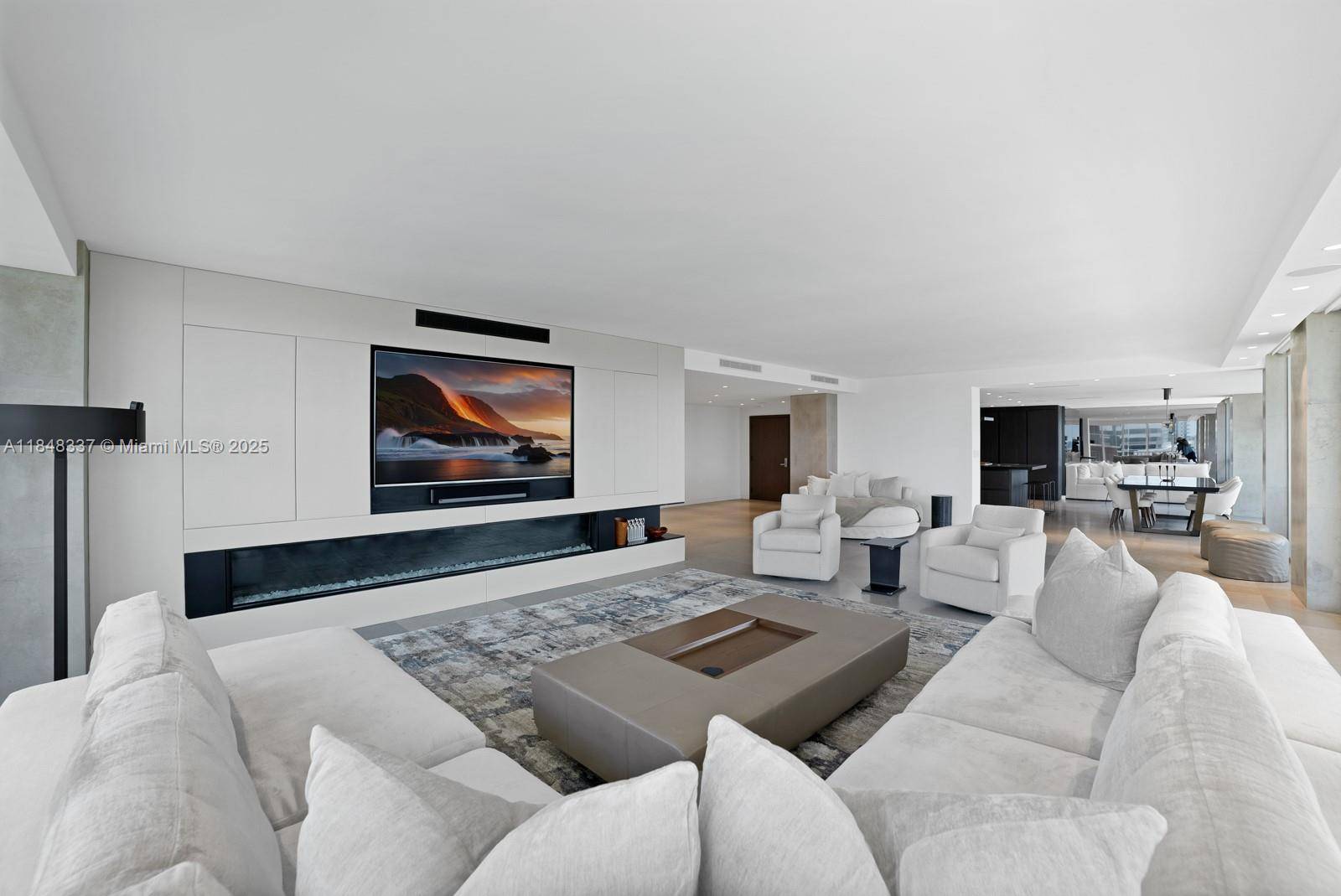 Welcome to Unit 1710, a masterpiece in luxury living, completely reimagined down to the studs.