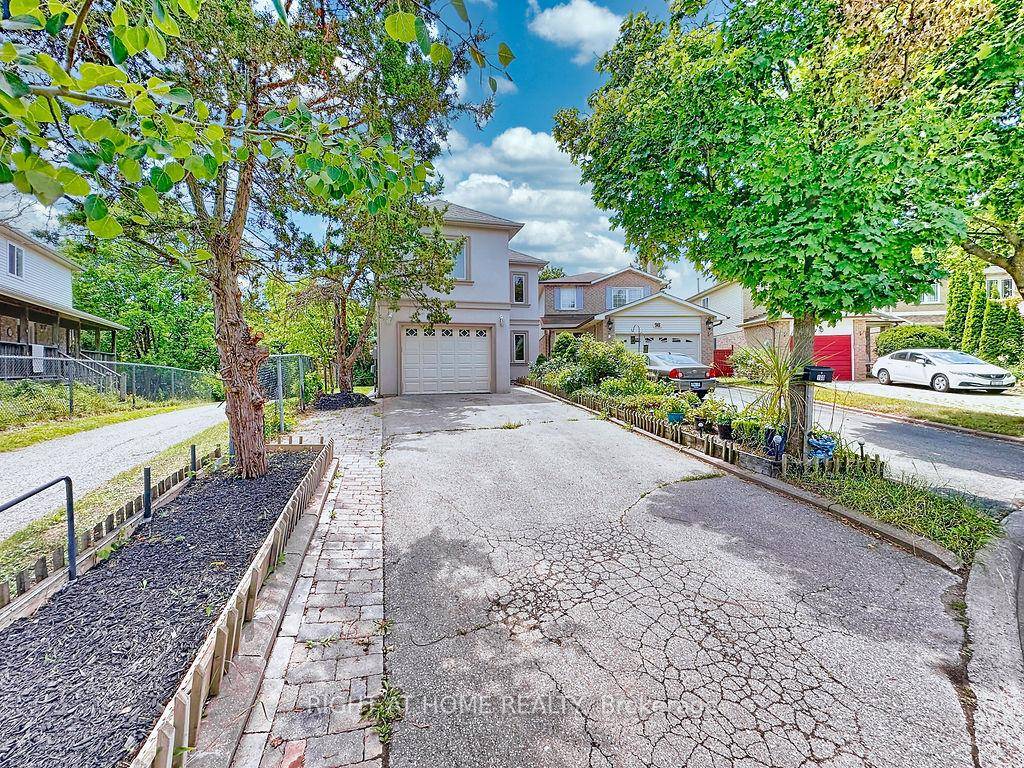 Welcome to 100 Greenbelt a thoughtfully maintained home nestled in the prestigious North Richvale community of Richmond Hill.