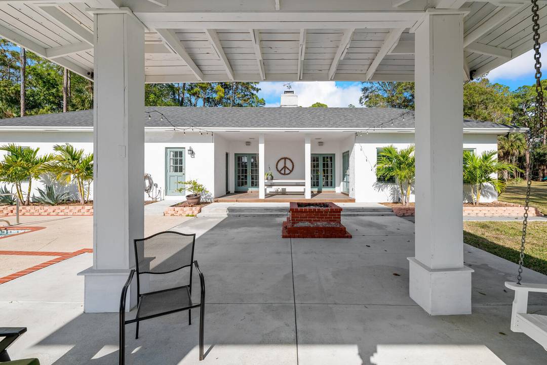 Situated on 10 tranquil, fully fenced acres, this completely renovated courtyard pool home is a rare blend of refined French Country design and peaceful country living.