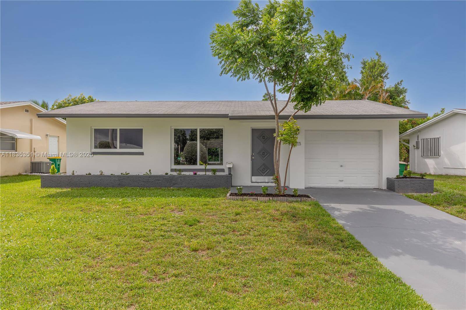 Impeccable 2 BR 2BA home with a 1 car garage in the sought after 55 Mainlands of Tamarac.