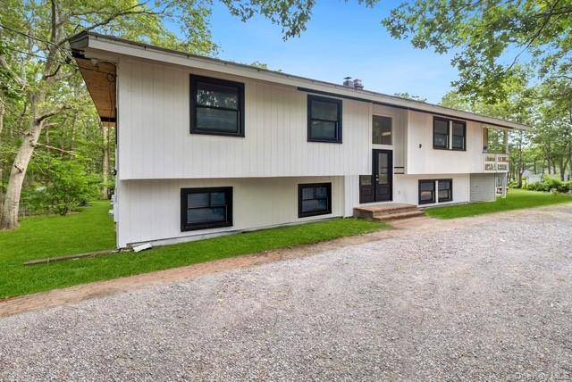 Welcome to 105 Old Riverhead Rd, Experience the best of the Hamptons living in this great High Ranch, modern elegance Perfectly positioned on a spacious 2.