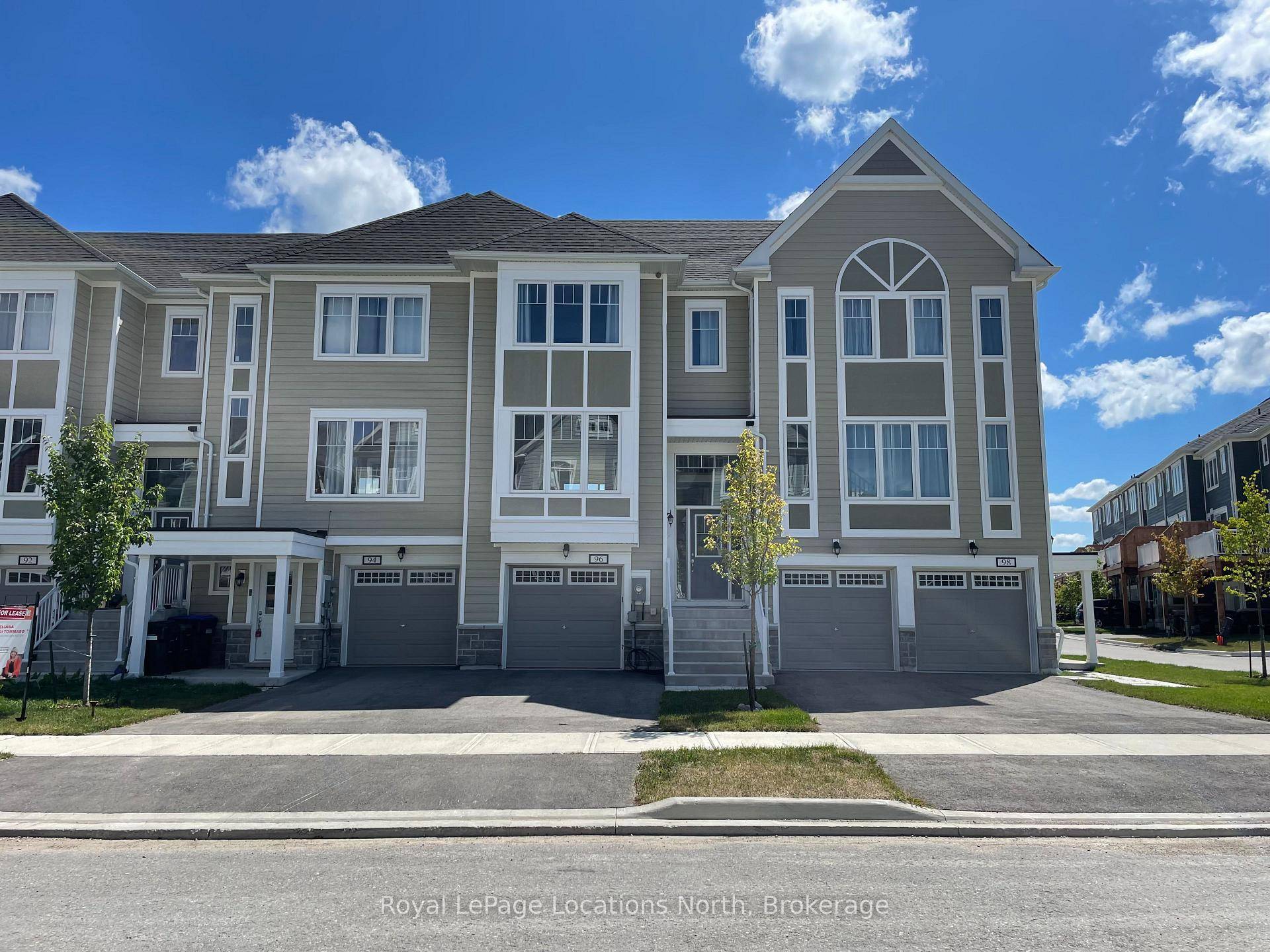 PREMIUM LOT BACKING ONTO GOLF COURSE Modern Traditional Style 3 bedroom Townhouse, plus gym with walk out to back yard.