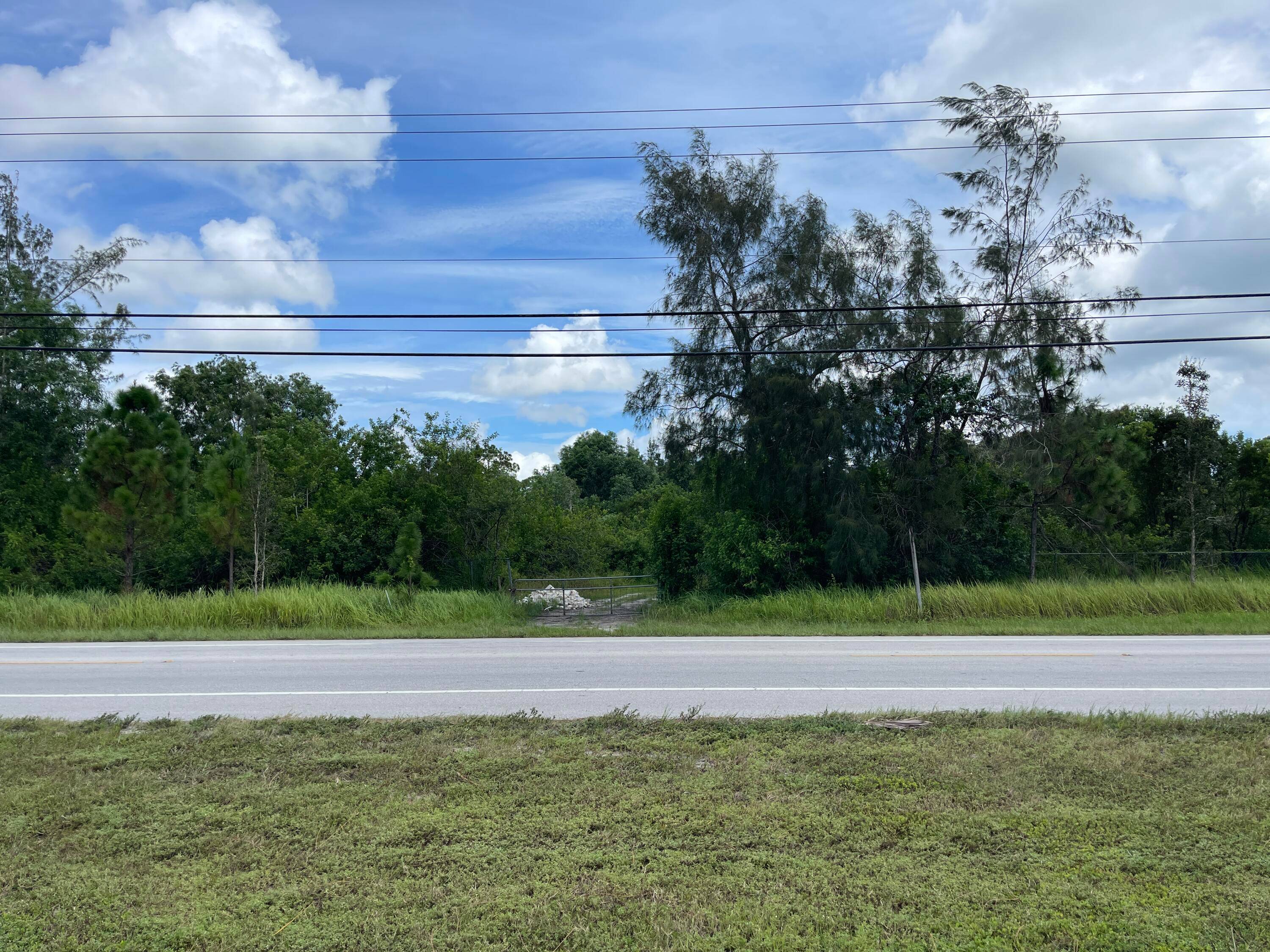 Don't miss this 5 Acres of vacant land with direct frontage on Okeechobee Blvd just east of D Rd.