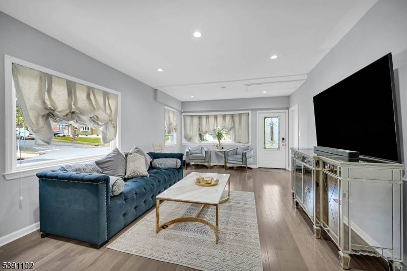 Welcome to this beautifully renovated and expanded Ranch, situated in the Hillcrest section.
